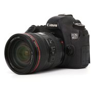 Canon EOS 60D three-quarter view with EF-S 18-200mm IS USM lens attached