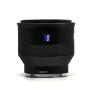 Sony ZEISS Batis 25mm f/2 lens standing upright on surface